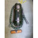 An old cylinder vacuum cleaner sold as c