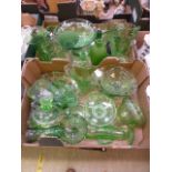 Two trays of green glassware