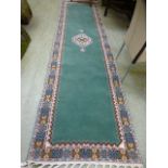 A handwoven Moroccan runner the border e