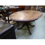 A walnut oval breakfast table