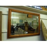 A modern pine bevel glass mirror