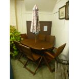 A set of six teak folding chairs along w