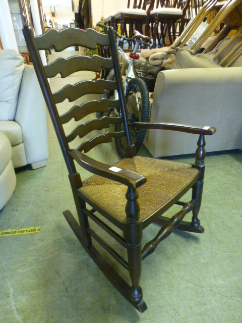 An ash framed rocking chair with seagras