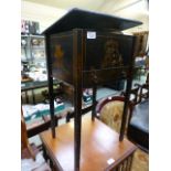 A black chinoiserie lacquered sewing box