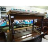 An Edwardian walnut music stool