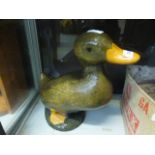 A painted stoneware duck