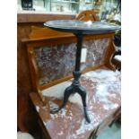 A black chinoiserie laquered pedestal ta