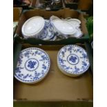 Two trays of blue and white tableware to