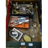 A tray of assorted flatware, photo frame