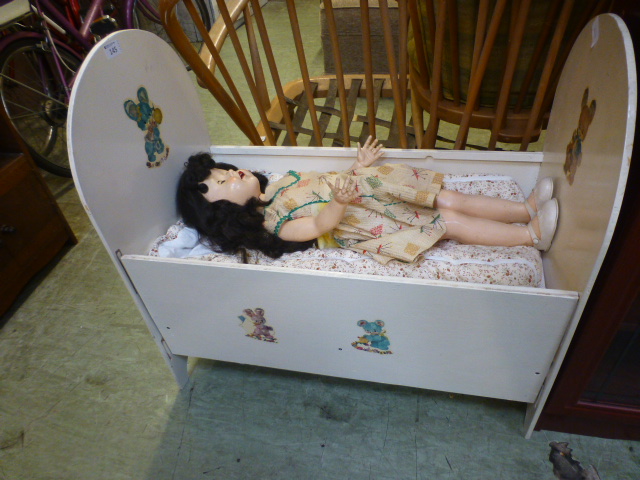 An early 20th century child's dolls cot