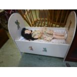 An early 20th century child's dolls cot