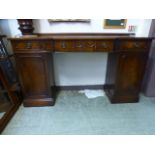 A reproduction mahogany twin pedestal sideboard