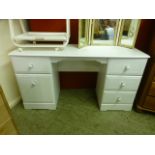 A white laminate dressing table