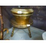 A brass spittoon together with a three l