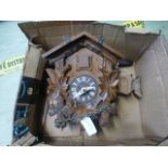 A box containing a cuckoo clock