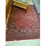 A red ground rug