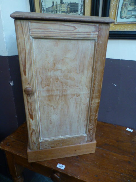 A 19th century pine pot cupboard