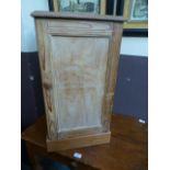 A 19th century pine pot cupboard