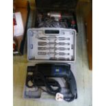A cased Power craft 750W power drill together with one other hammer drill