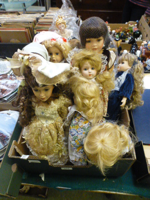 A tray of collector's dolls