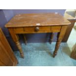 A 19th century pine single drawer side t