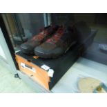 A pair of men's brown trainers size 13