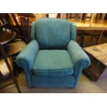 A modern turquoise easy chair