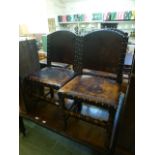 A set of four early 20th century oak and