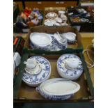 Two trays of blue and white tableware to