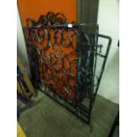 A pair of black metalwork gates