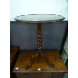 A 19th century mahogany tripod table, th