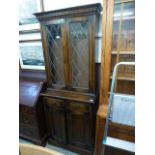 An early 20th century oak bookcase, the