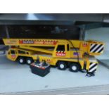 A Tonka Super Crane toy with accessories