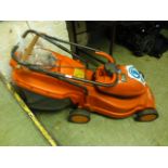 A Flymo battery powered lawn mower