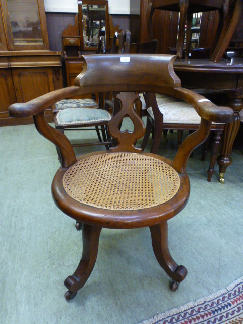 A 19th century mahogany swivel office ch