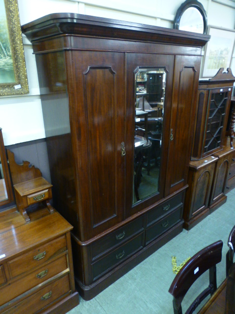 A late 19th century mahogany wardrobe, t