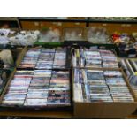 Four trays of DVDs