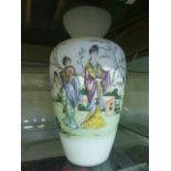 A Chinese glass vase decorated with figu