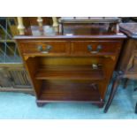 A yew veneered open bookcase having two