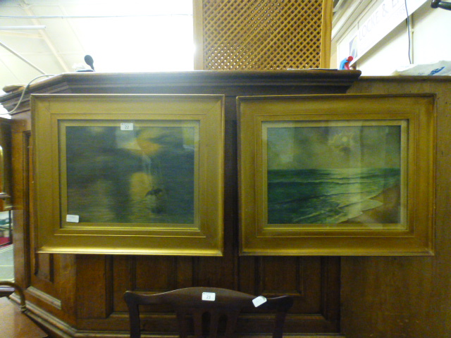 A pair of gilt framed and glazed water c