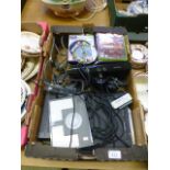 A tray containing an Xbox and games etc.