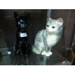 Two ceramic cats