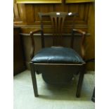 An 18th century mahogany commode chair