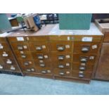 Two banks of early 20th century drawers