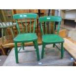 Two green painted child's chairs