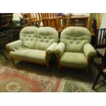 A modern cut fabric two seat settee toge