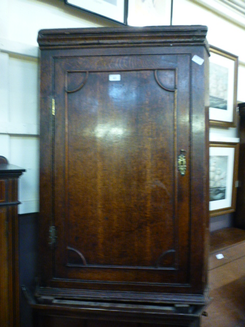 An 18th century oak wall hanging corner