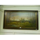 A framed oil on canvas of hunting scene