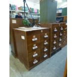 Two banks of early 20th century drawers