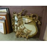 A gilt framed baroque style mirror (A/F)